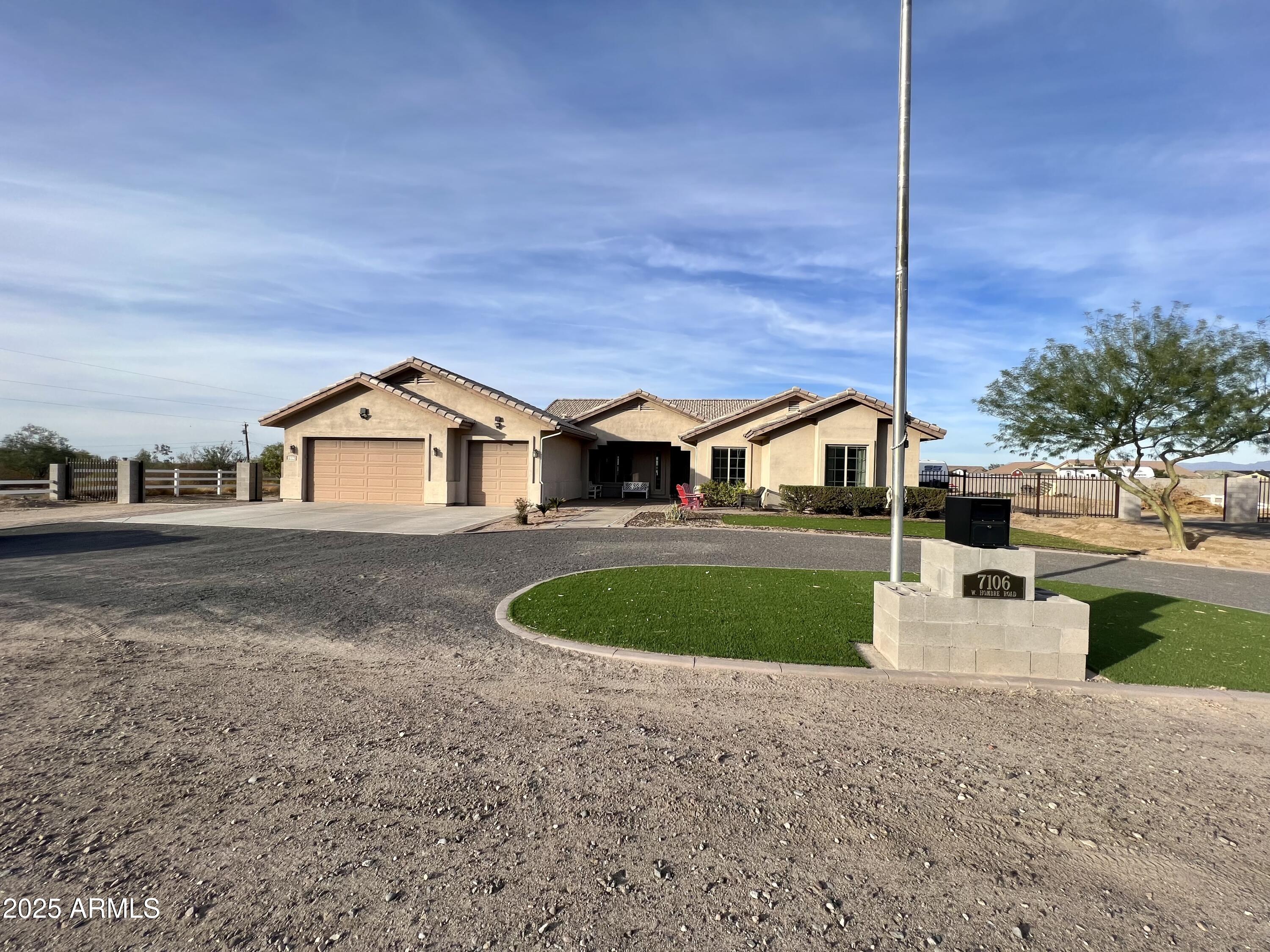 7106 W HOMBRE Road, San Tan Valley, AZ 85144 — Photo 1 of 50
