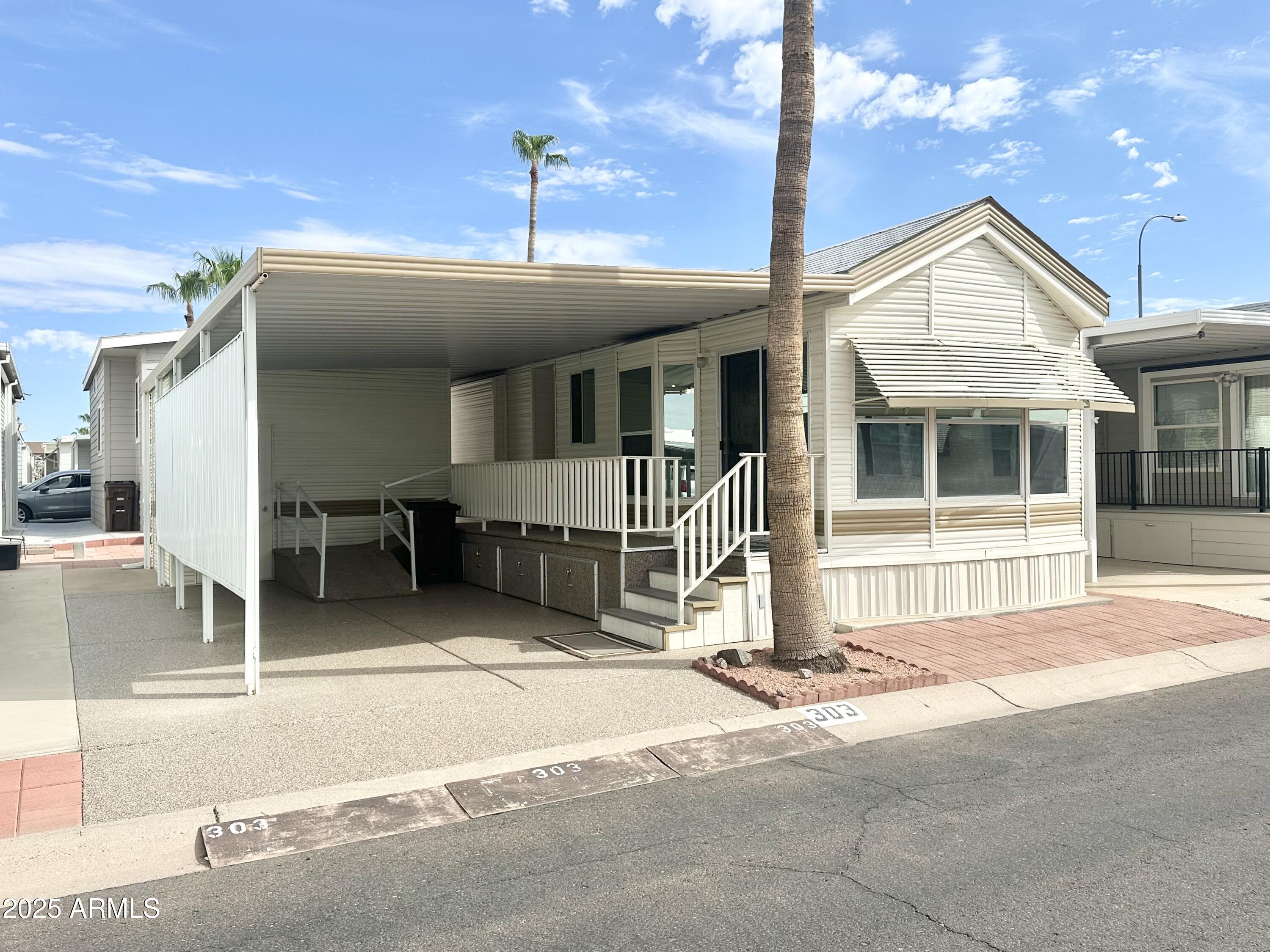 303 S DIAMOND Drive, Apache Junction, AZ 85119 — Photo 1 of 55