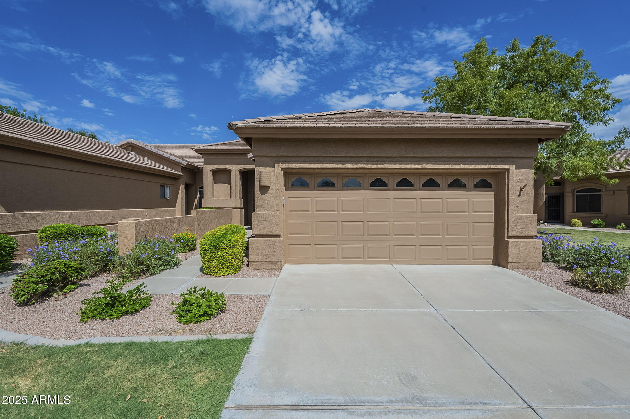 9612 E CHAMPAGNE Drive, Sun Lakes, AZ 85248 — Photo 1 of 61