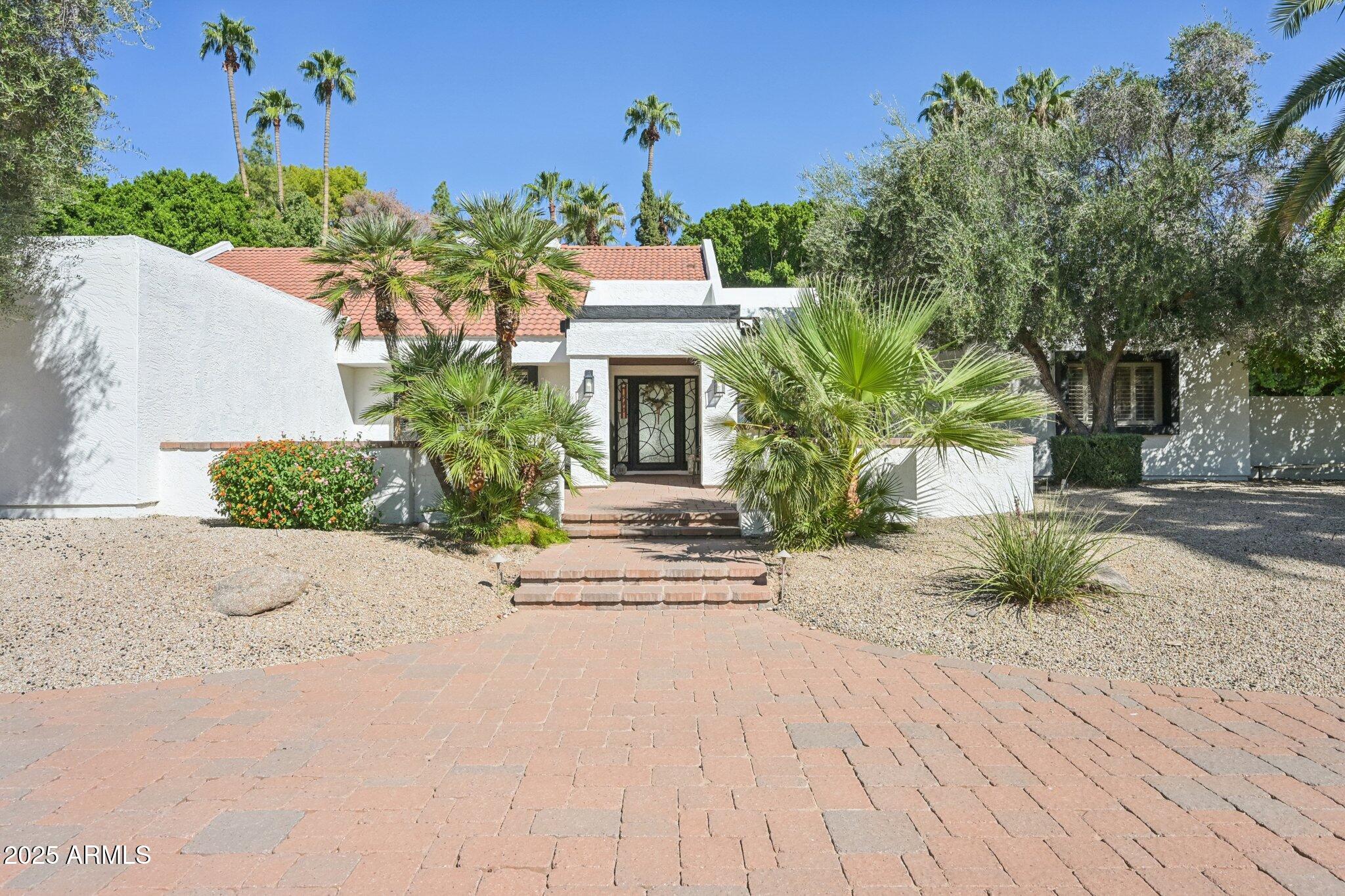 540 E CERCADO Lane, Litchfield Park, AZ 85340 — Photo 1 of 57