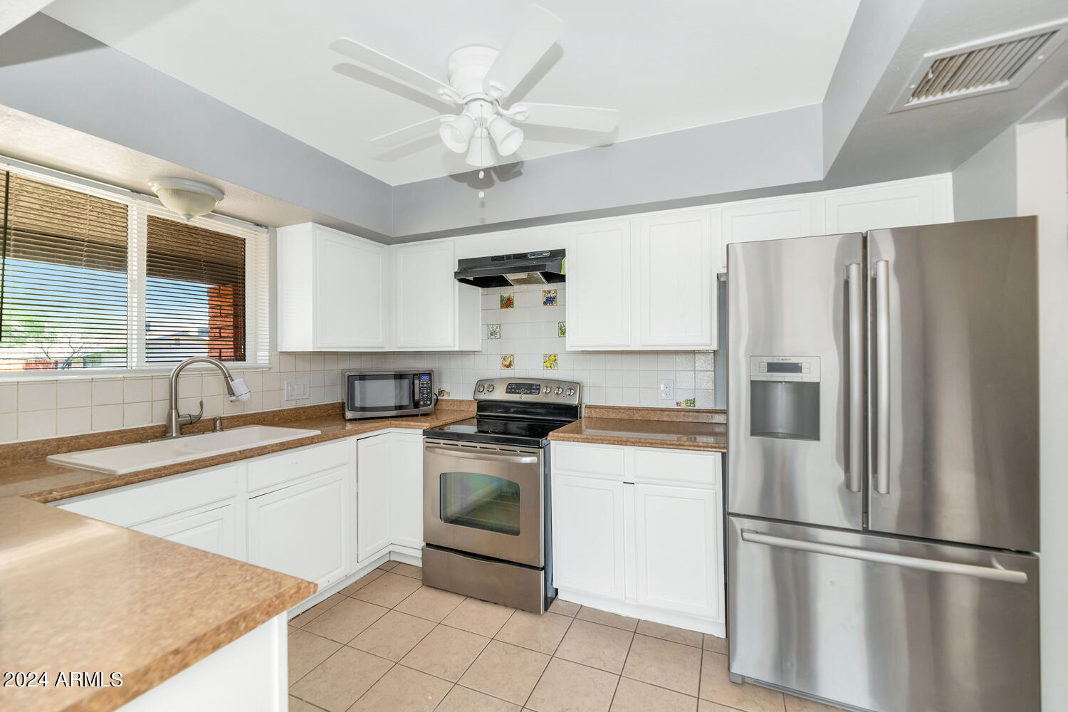 316 E VOGEL Avenue, Phoenix, AZ 85020 — Photo 1 of 65