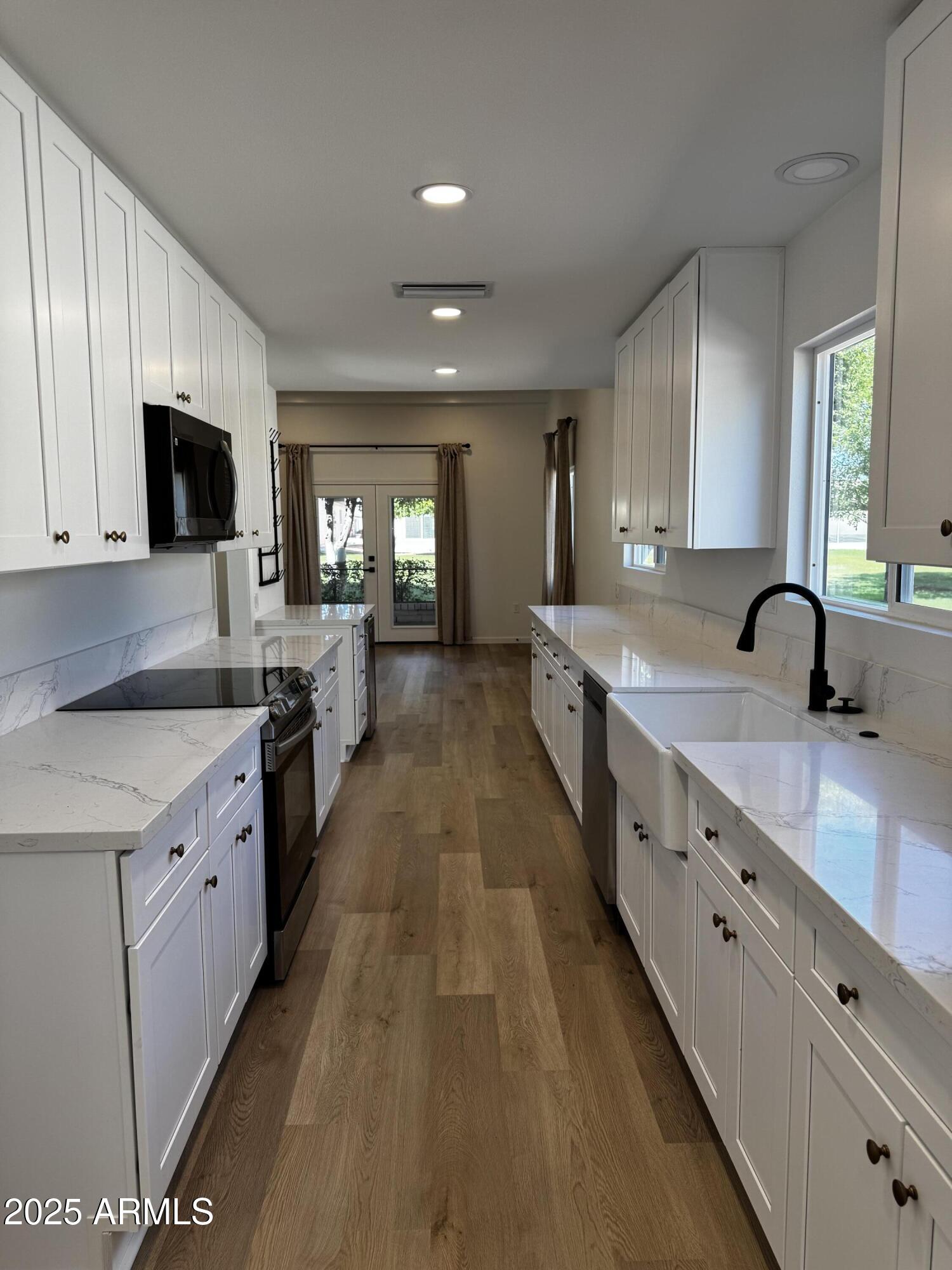 10318 W Manzanita Drive, Sun City, AZ 85373 — Photo 1 of 45