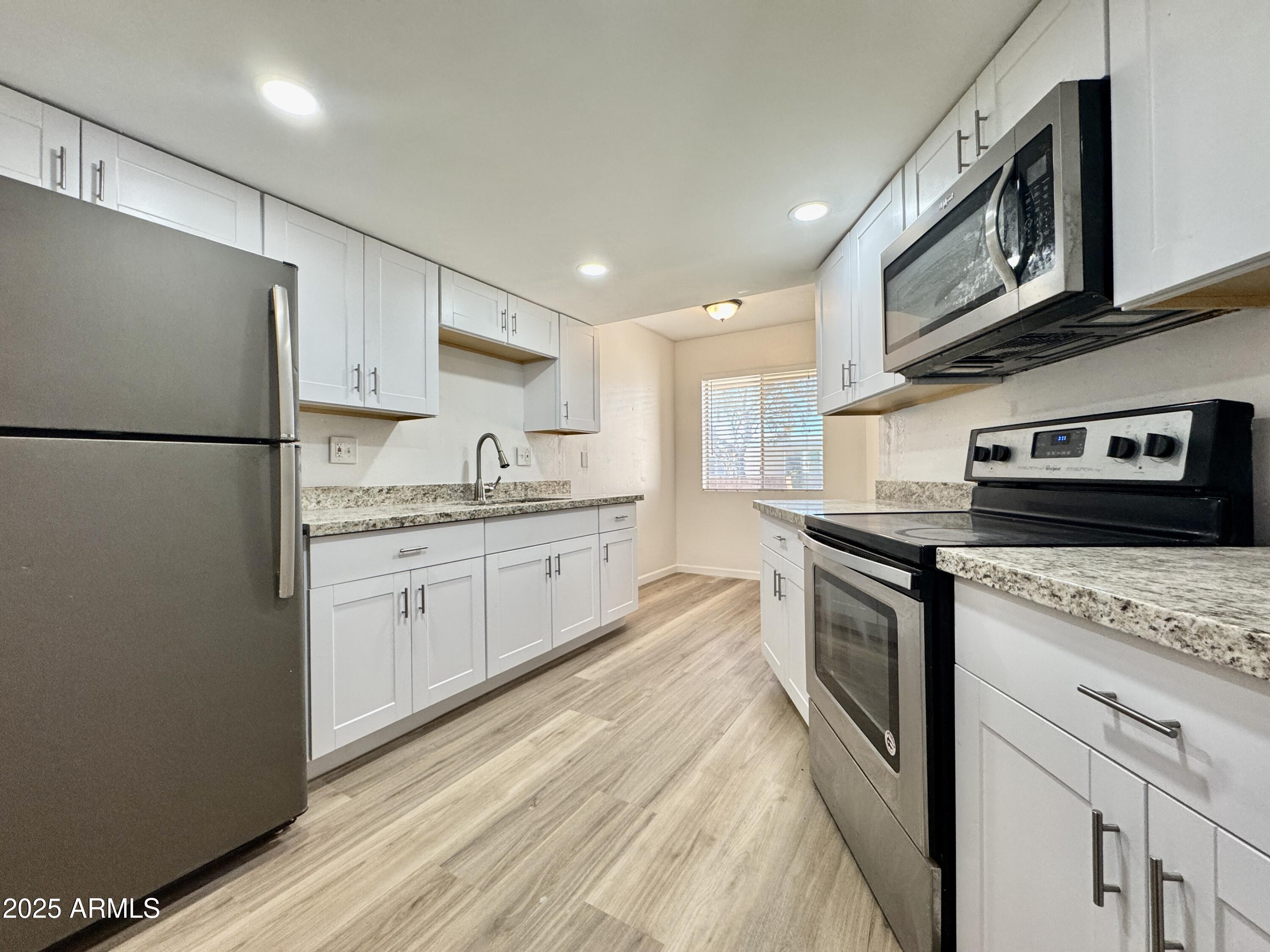 10949 W COGGINS Drive, Sun City, AZ 85351 — Photo 1 of 9