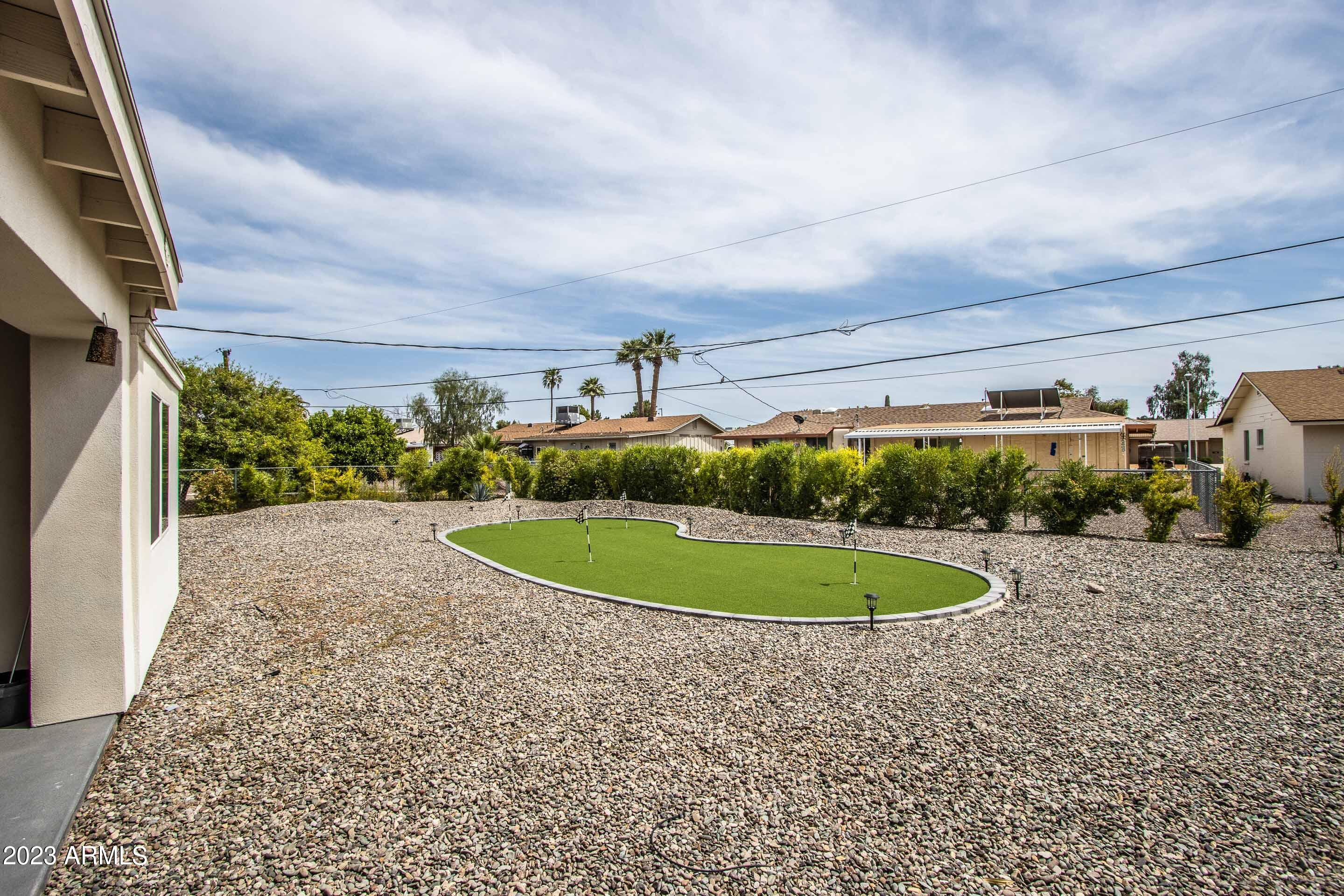 10141 W PEBBLE BEACH Drive, Sun City, AZ 85351 — Photo 1 of 38