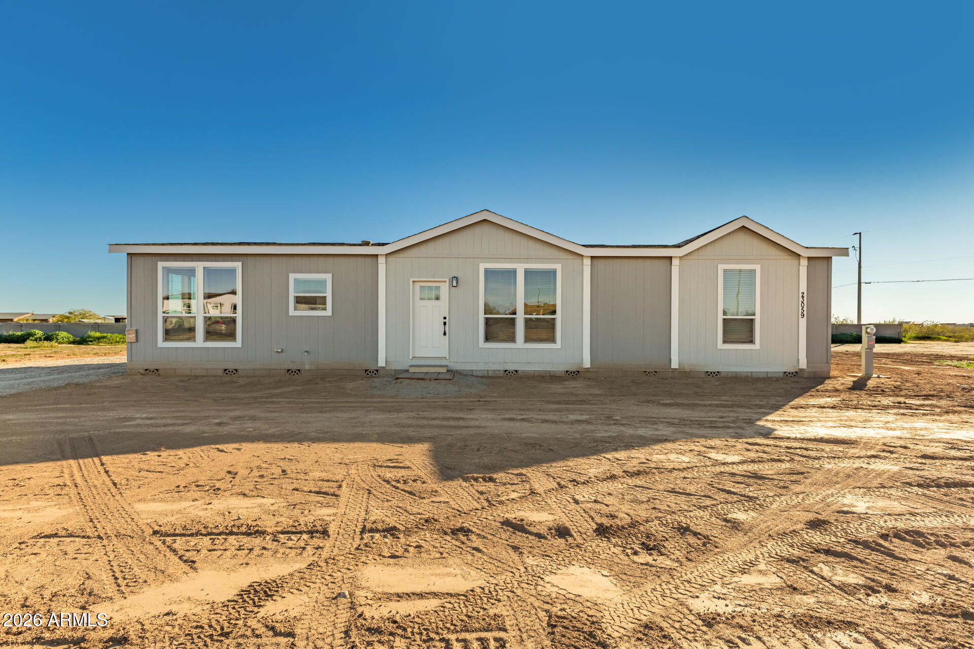 23059 W RANCHO LAREDO Drive, Wittmann, AZ 85361 — Photo 1 of 29