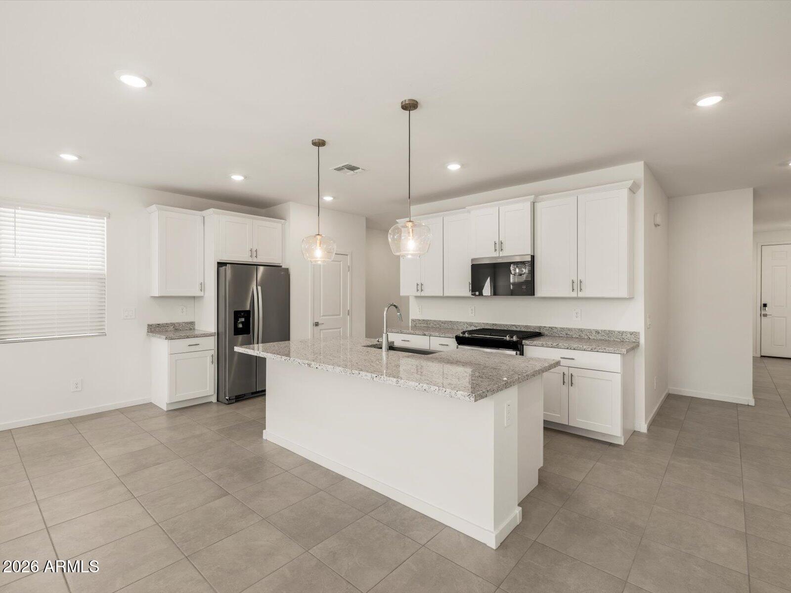 17563 W WOODLANDS Avenue, Goodyear, AZ 85338 — Photo 1 of 40