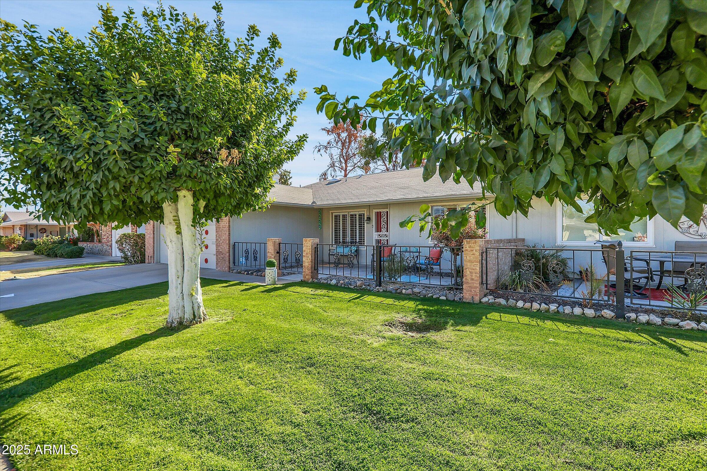 10825 W CARON Drive, Sun City, AZ 85351 — Photo 1 of 35