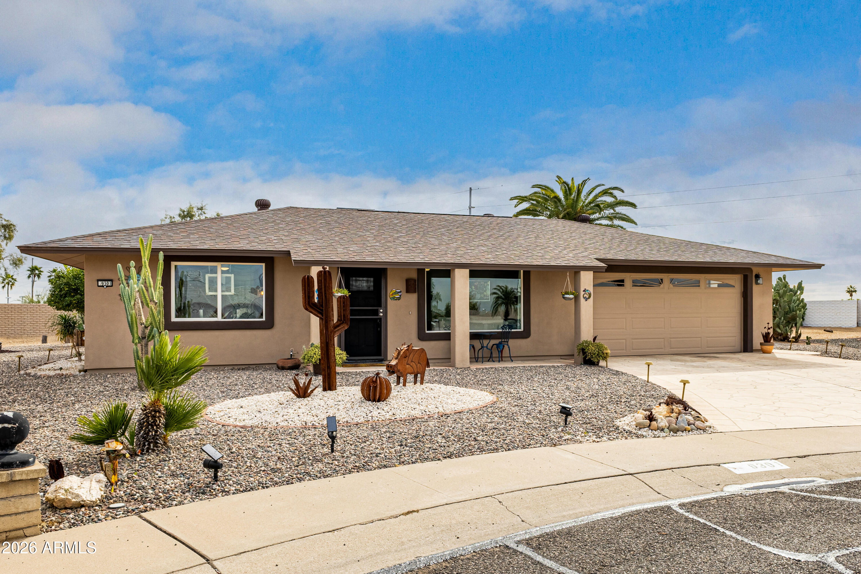 9301 W WILD HORSE Court, Sun City, AZ 85373 — Photo 1 of 24