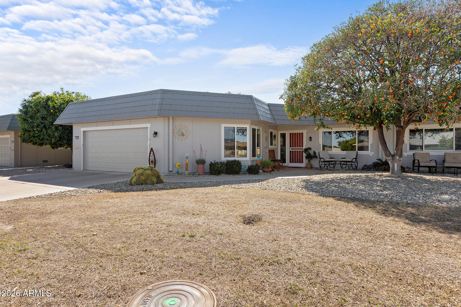 10457 W CAMPANA Drive, Sun City, AZ 85351 — Photo 1 of 50