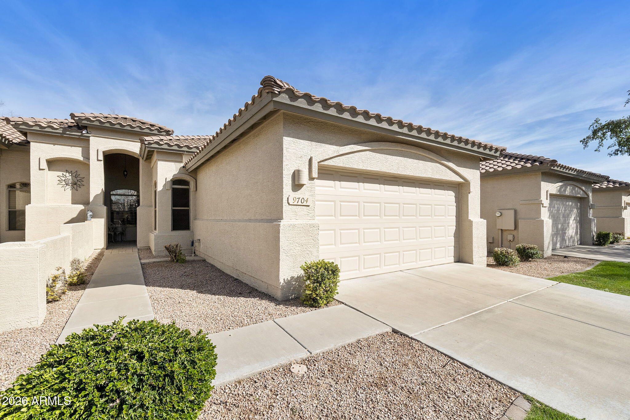 9704 E TRANQUILITY Way, Sun Lakes, AZ 85248 — Photo 1 of 57
