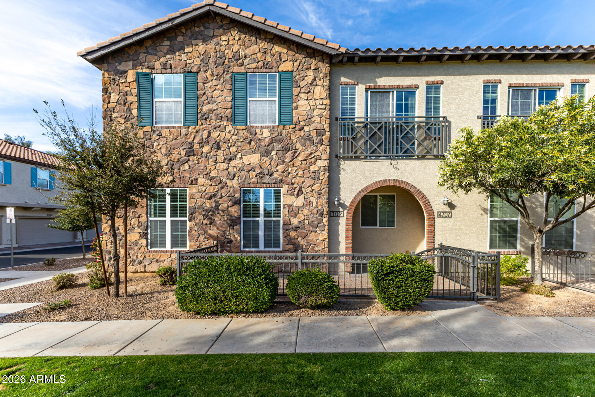 4707 E THUNDERHEART Trail 102, Gilbert, AZ 85297 — Photo 1 of 45