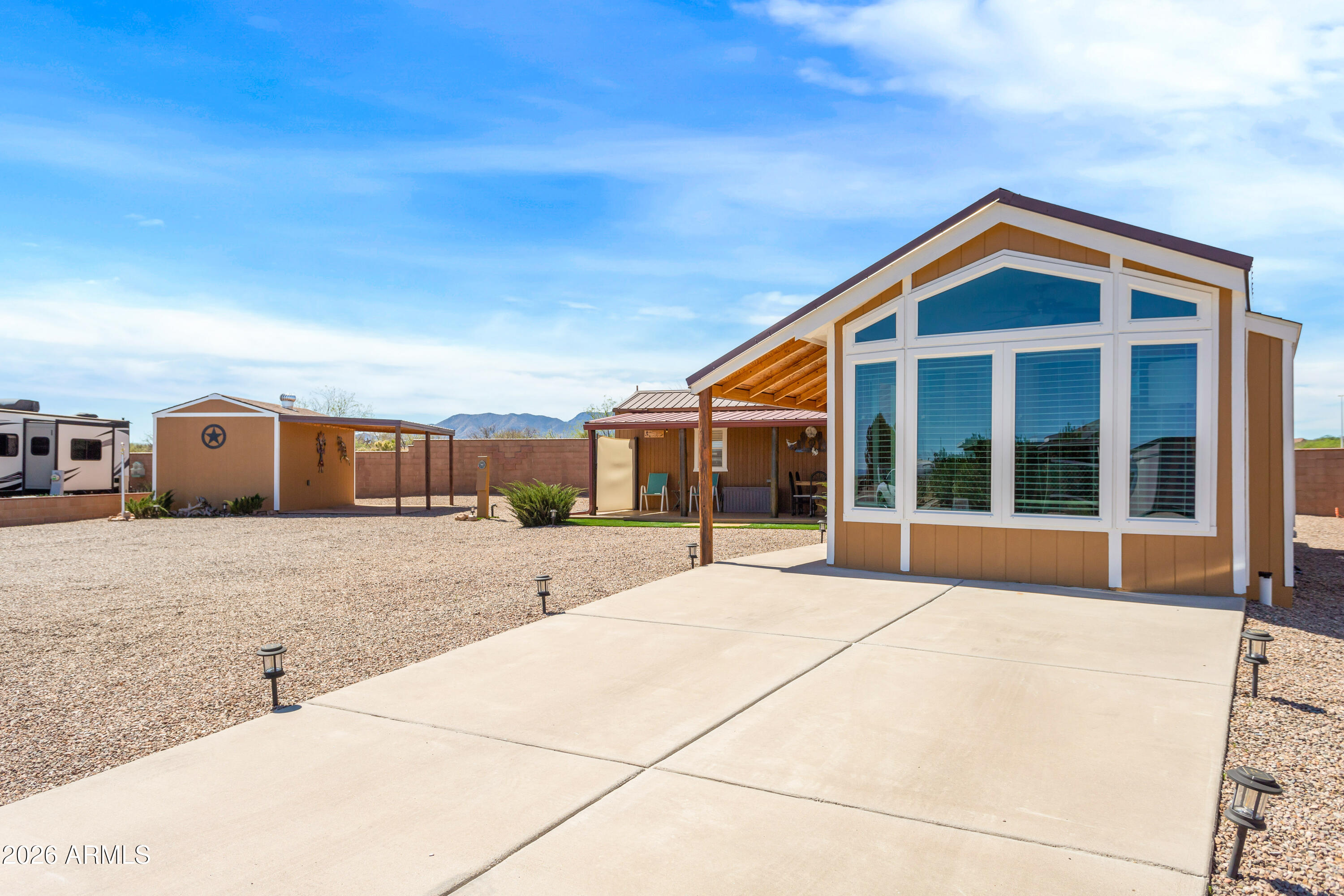 1915 W CASA DEL RIO Drive 7, Benson, AZ 85602 — Photo 1 of 42