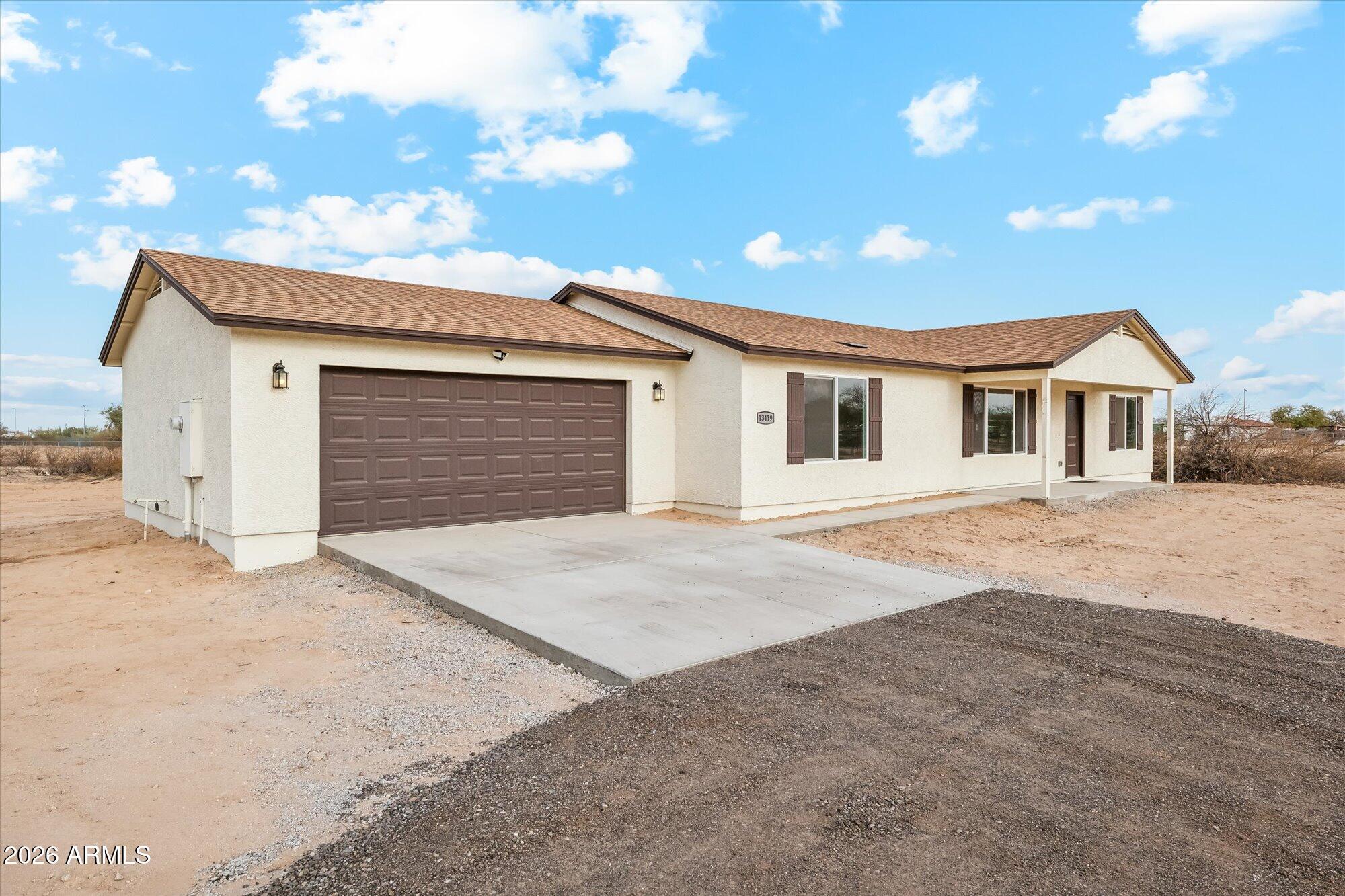 19467 W TEAKWOOD Drive, Buckeye, AZ 85326 — Photo 1 of 35
