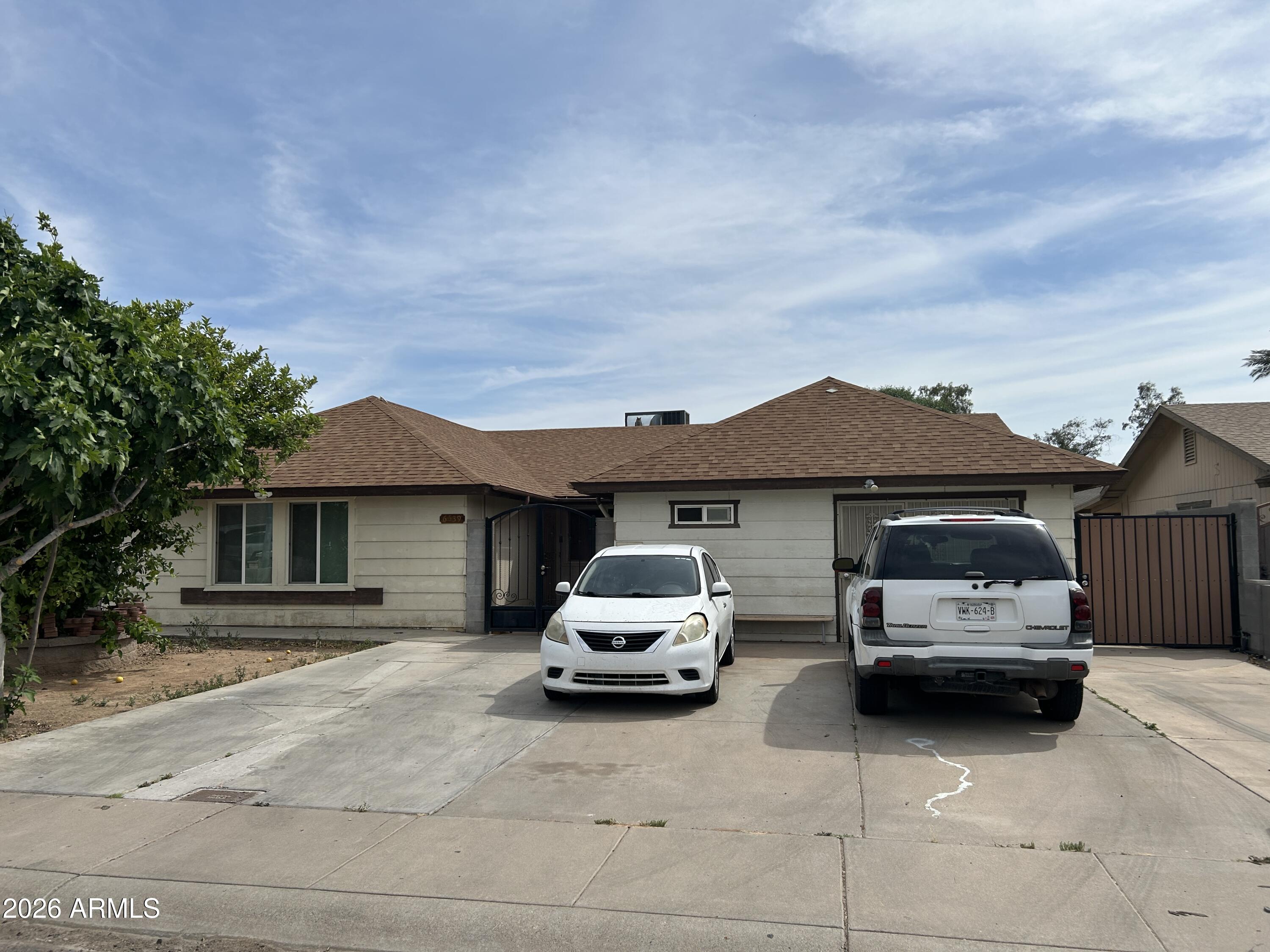6539 W COOLIDGE Street, Phoenix, AZ 85033 — Photo 1 of 28