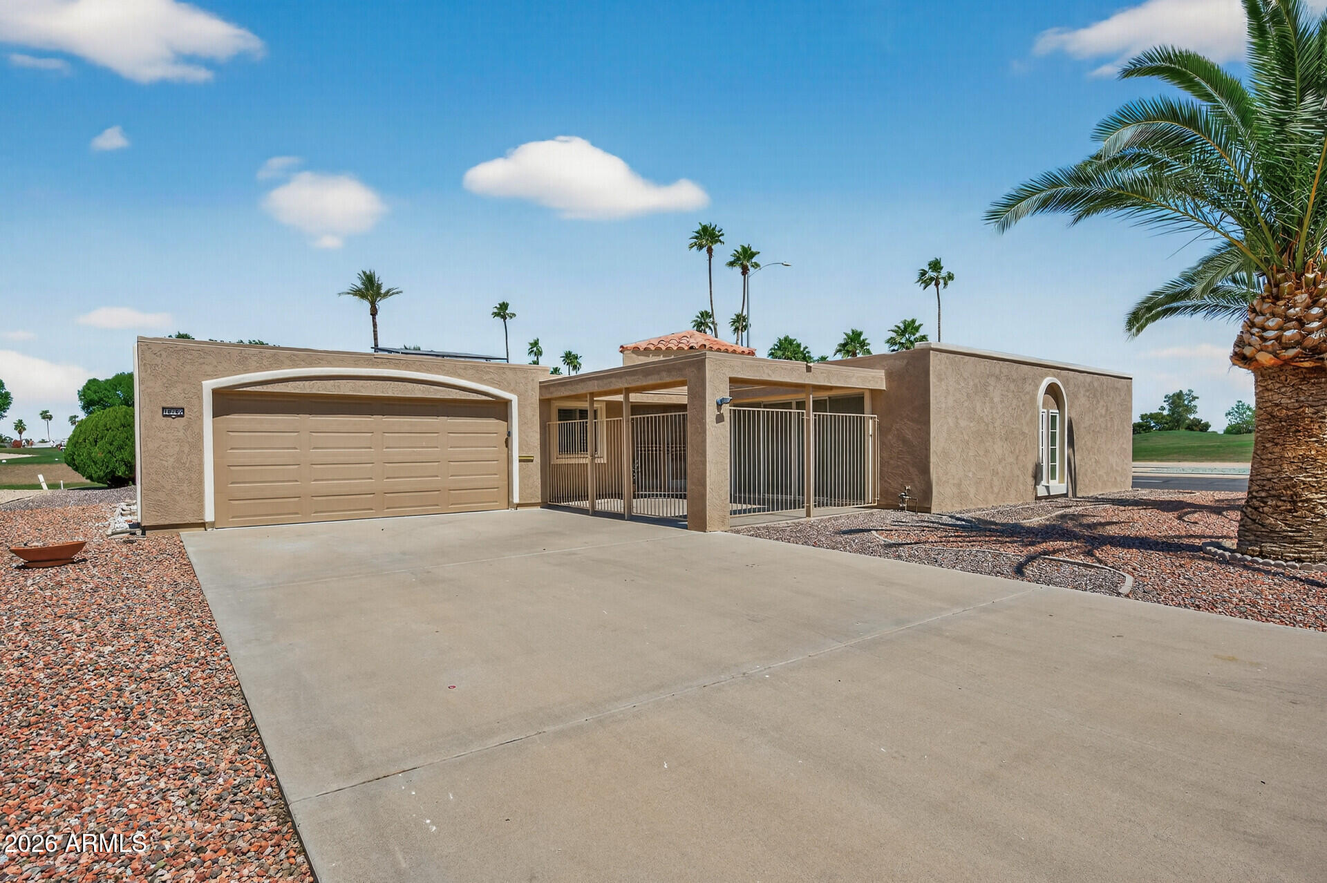 10702 W WEDGEWOOD Drive, Sun City, AZ 85351 — Photo 1 of 60
