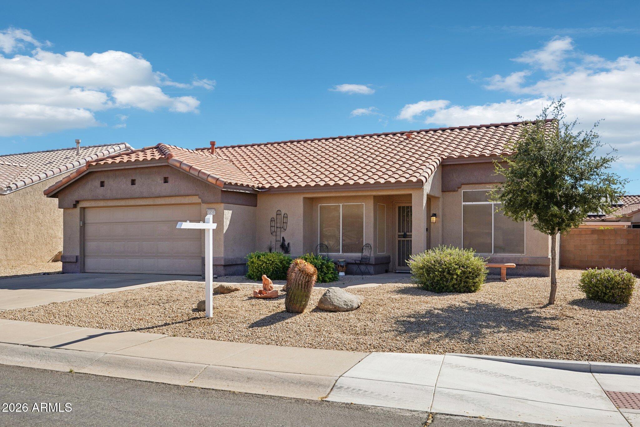 13712 W UTICA Drive, Sun City West, AZ 85375 — Photo 1 of 62