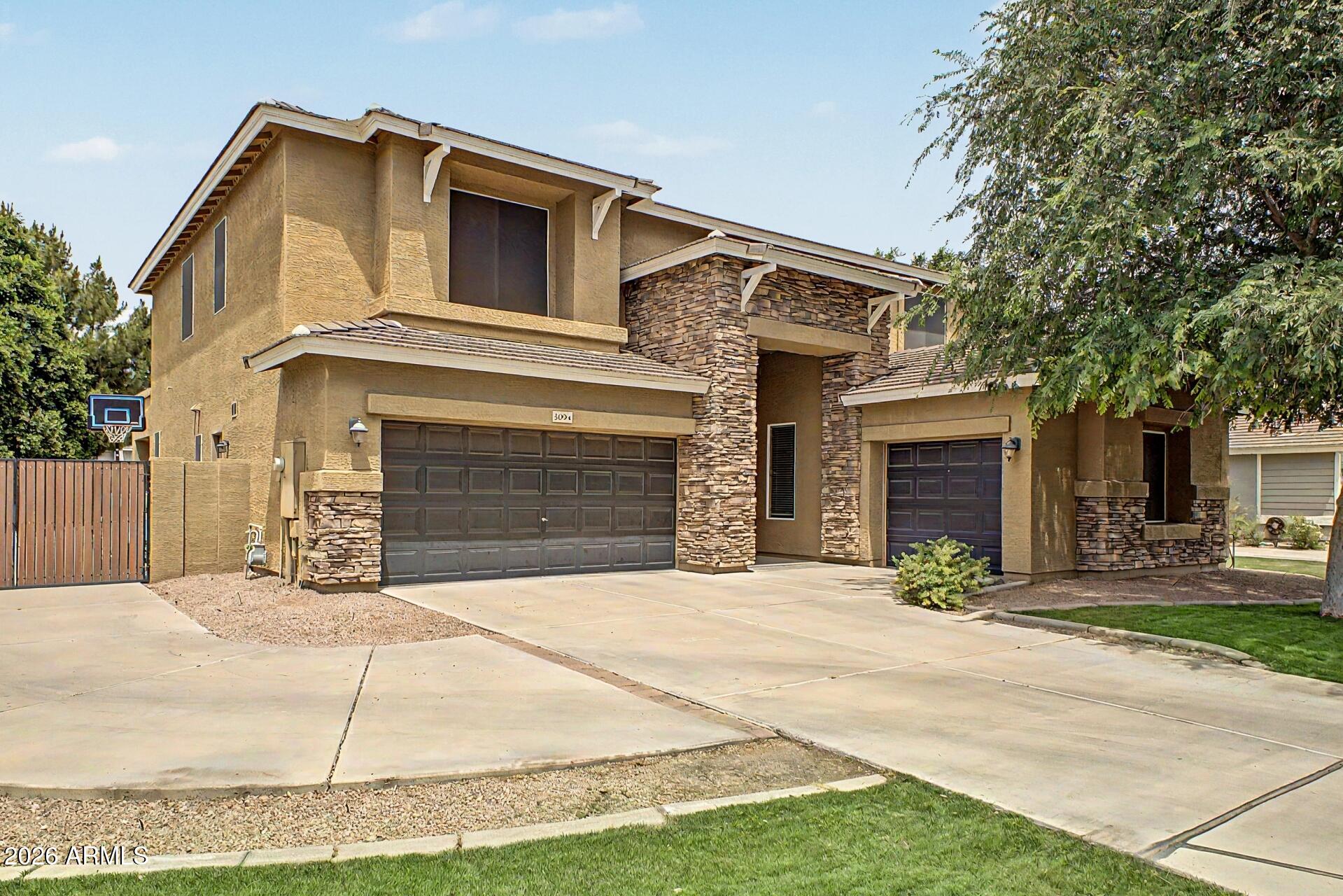 3094 E COTTON Lane, Gilbert, AZ 85234 — Photo 1 of 41