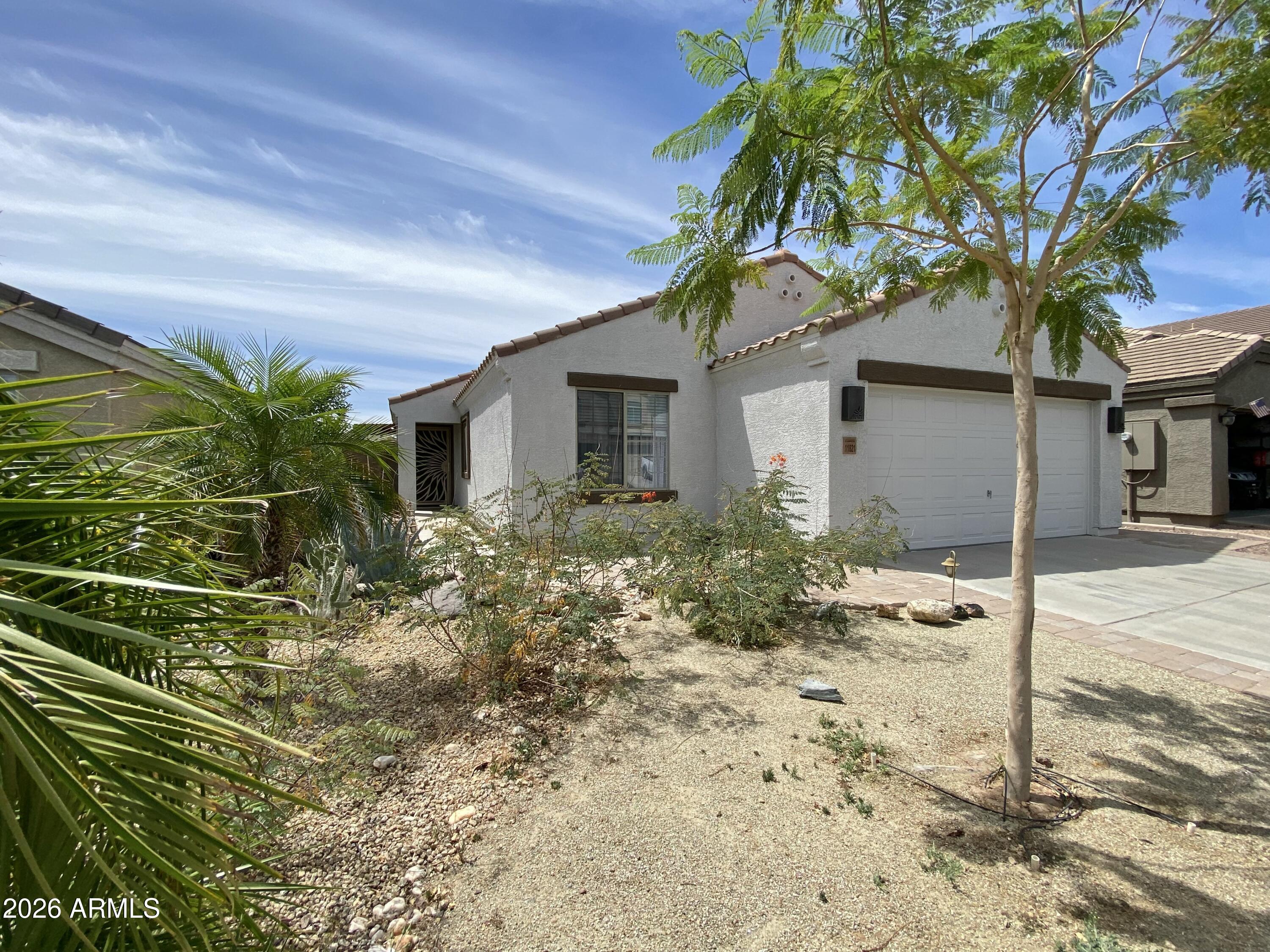 11821 W DOS RIOS Drive, Sun City, AZ 85373 — Photo 1 of 24