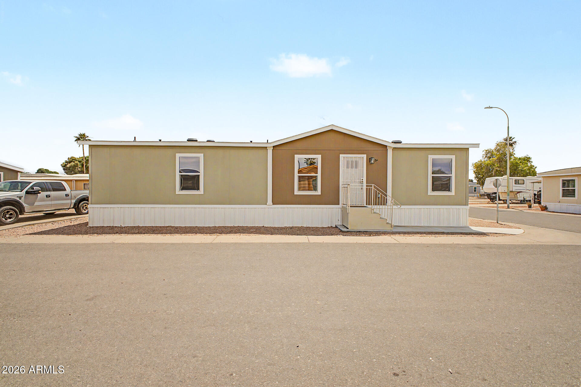 320 E MCKELLIPS Road 100, Mesa, AZ 85201 — Photo 1 of 24