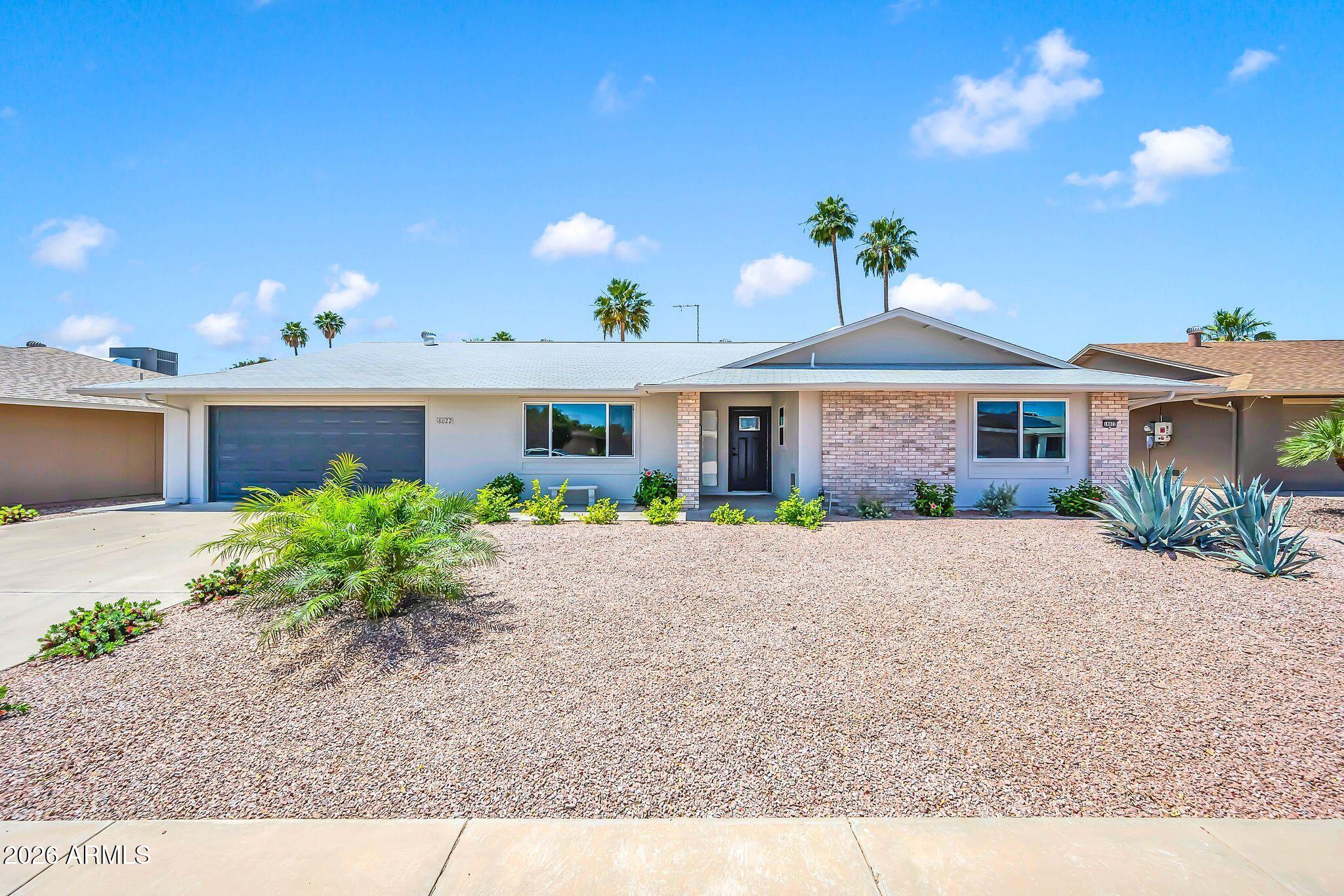 18022 N 134th Avenue, Sun City West, AZ 85375 — Photo 1 of 49
