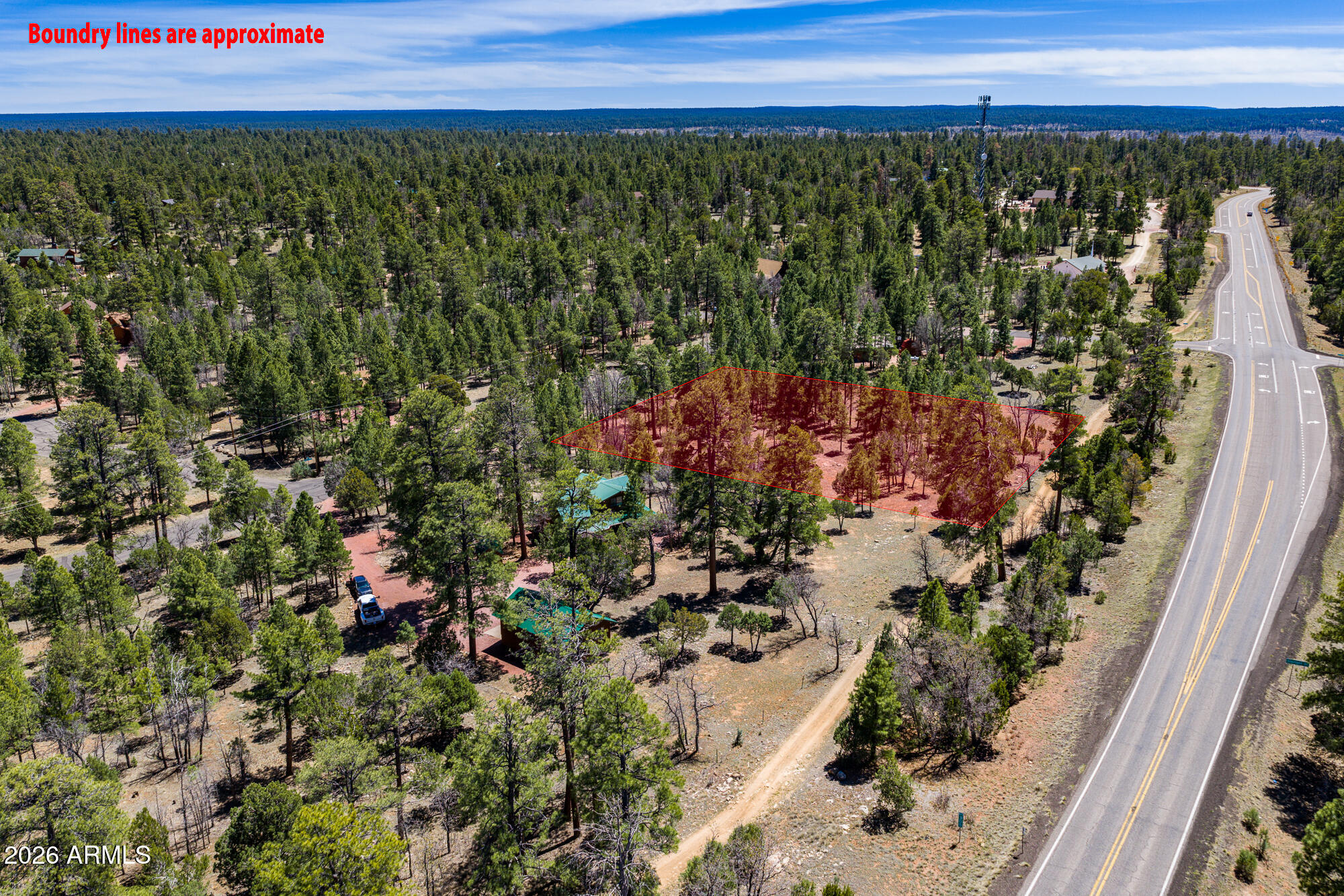 2118 SADDLE BLANKET Road 29, Happy Jack, AZ 86024 — Photo 1 of 24