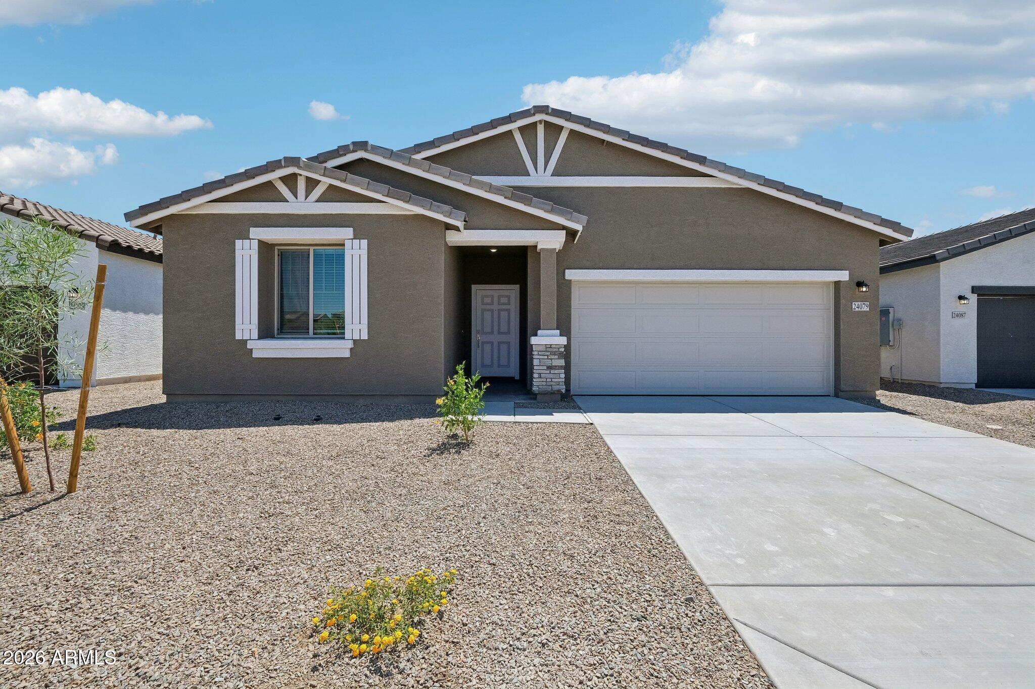 24079 W HUNTINGTON Drive, Buckeye, AZ 85326 — Photo 1 of 44
