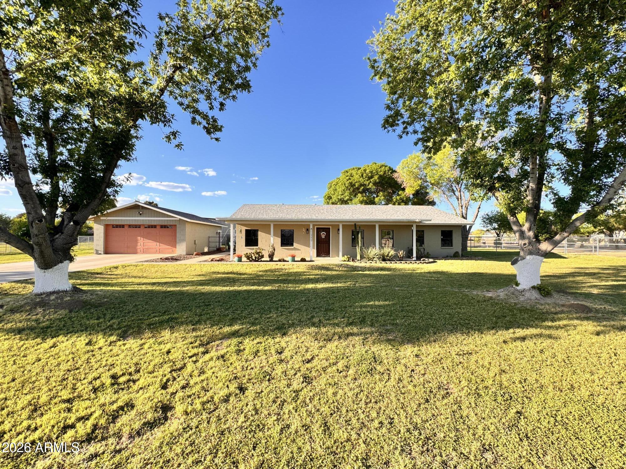 11202 W WINSLOW Avenue, Tolleson, AZ 85353 — Photo 1 of 59