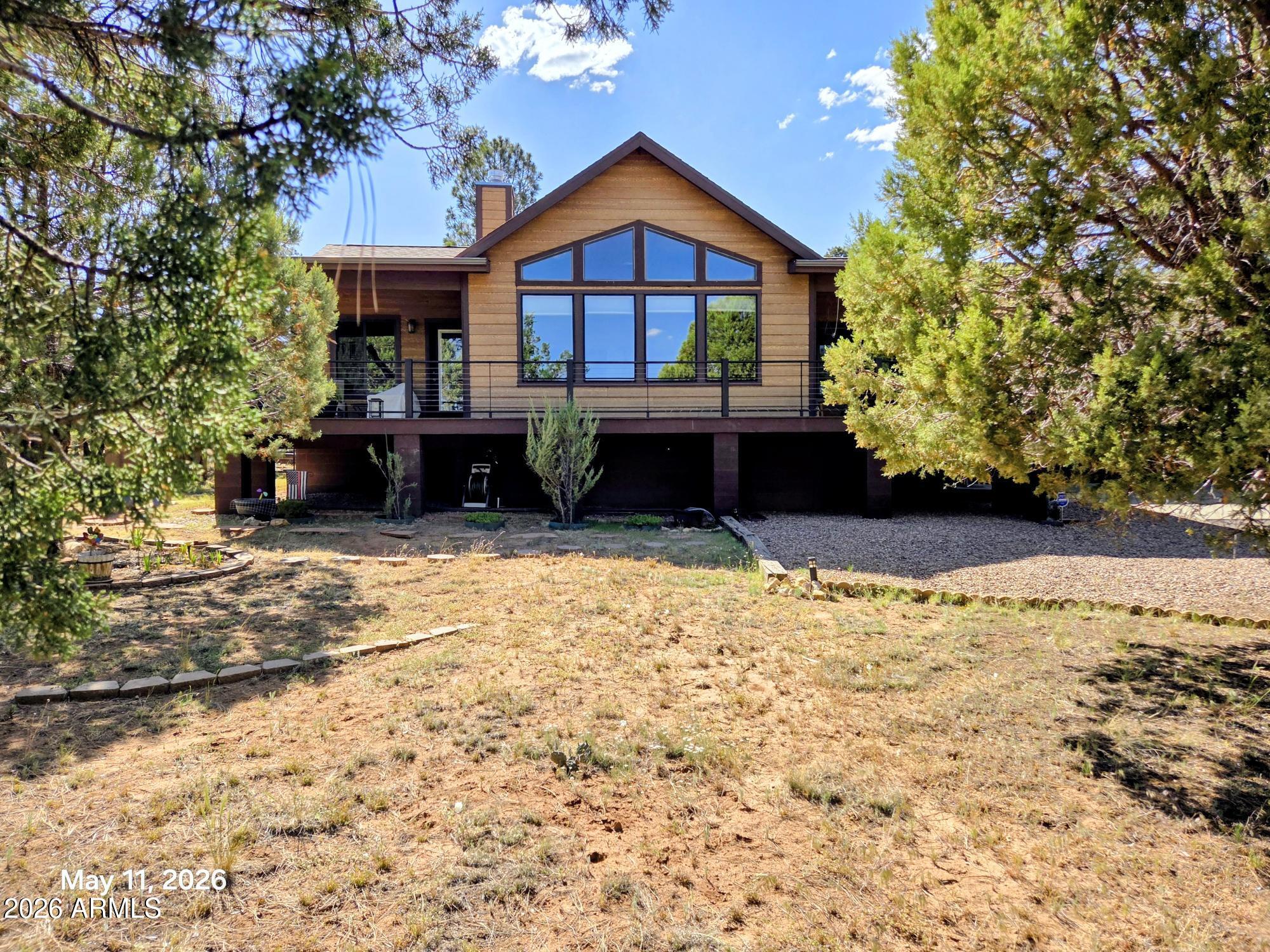 2974 ARROWHEAD Drive, Overgaard, AZ 85933 — Photo 1 of 26