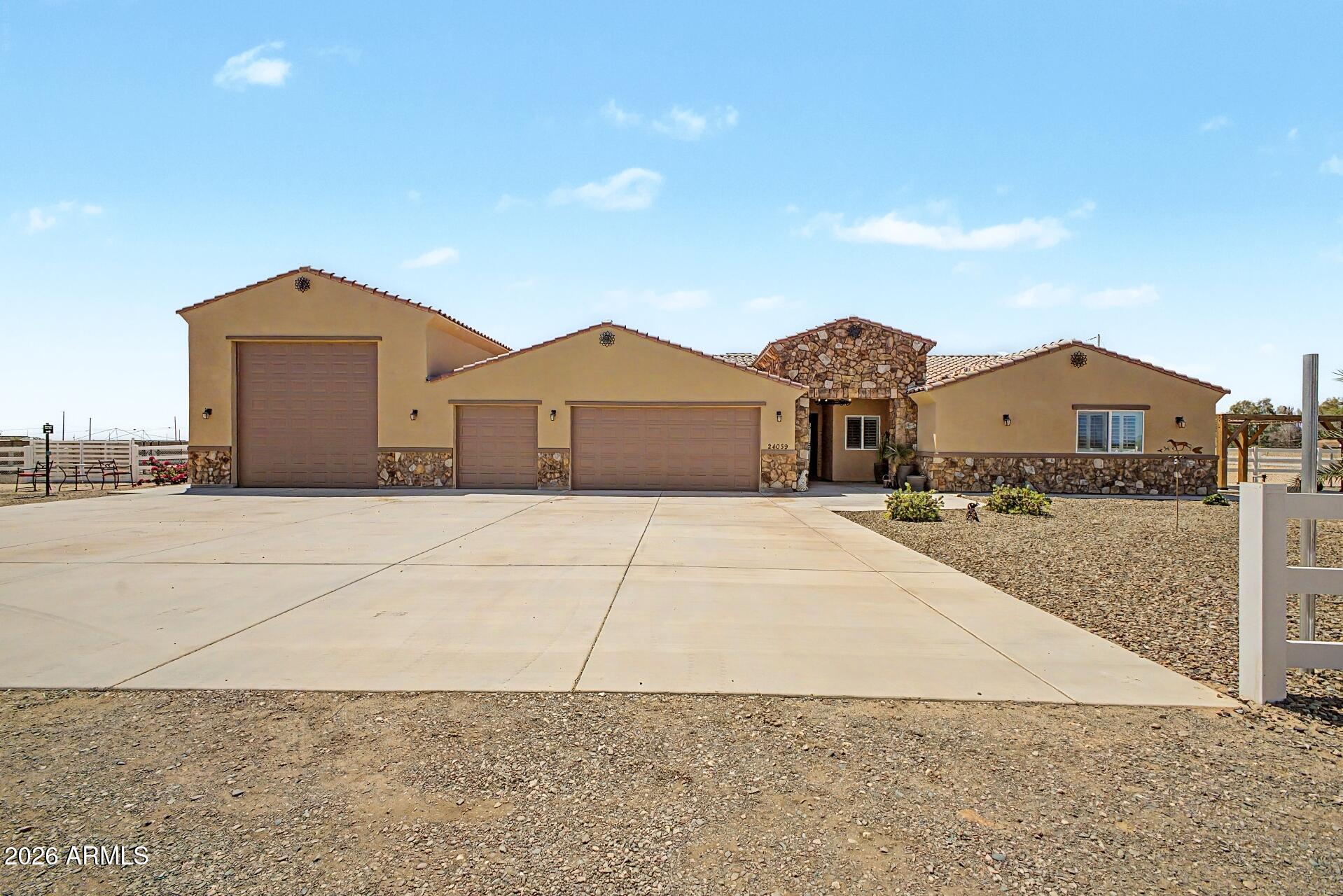 24039 W Cavedale Drive, Wittmann, AZ 85361 — Photo 1 of 56