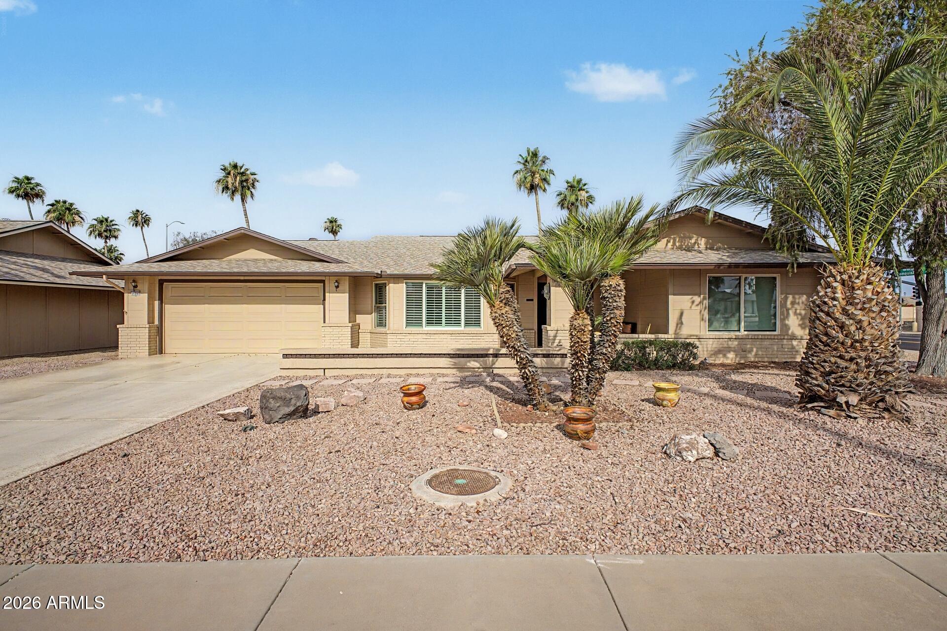 17242 N DESERT GLEN Drive, Sun City West, AZ 85375 — Photo 1 of 80