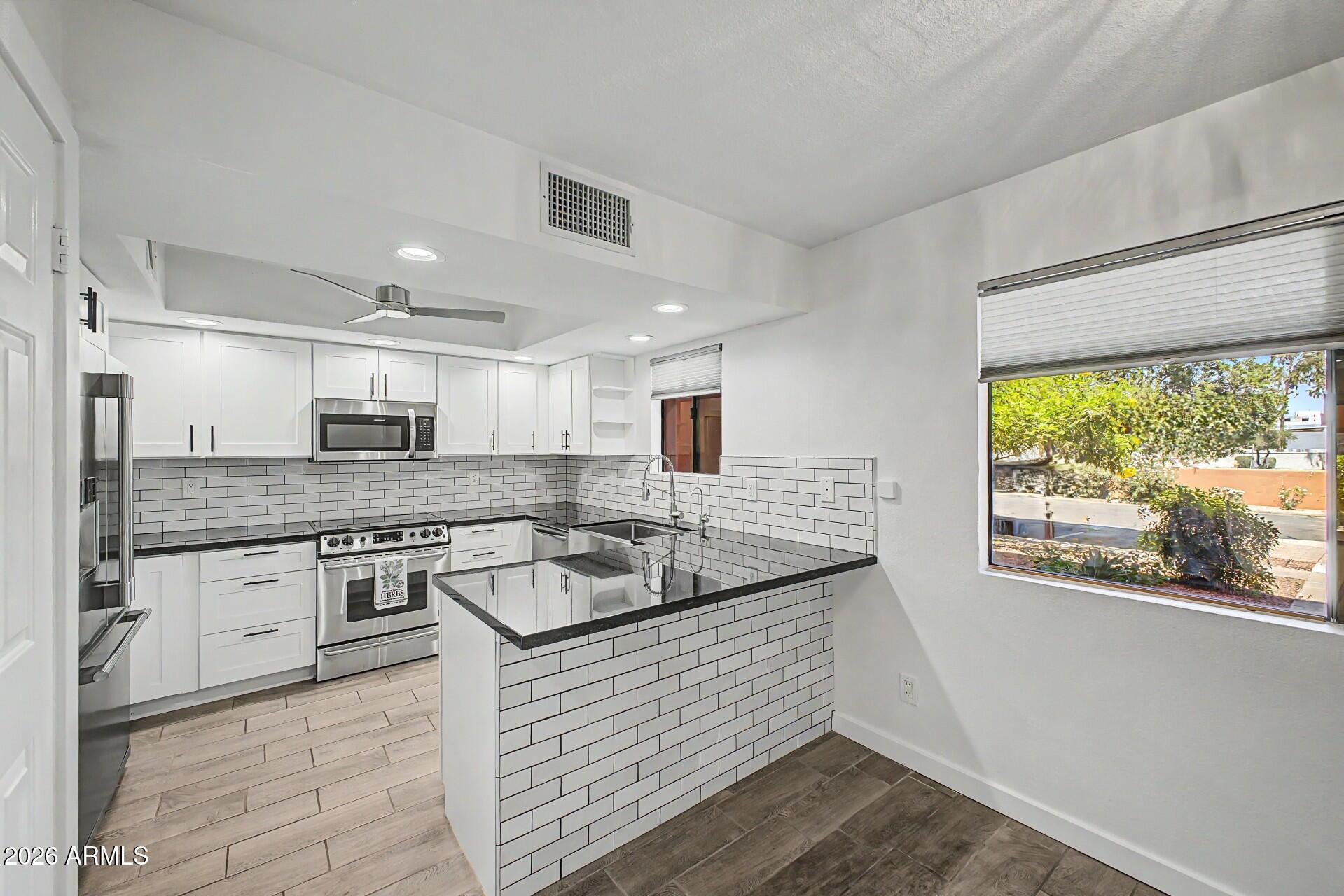 12222 N PARADISE VILLAGE Parkway S 107, Phoenix, AZ 85032 — Photo 1 of 17
