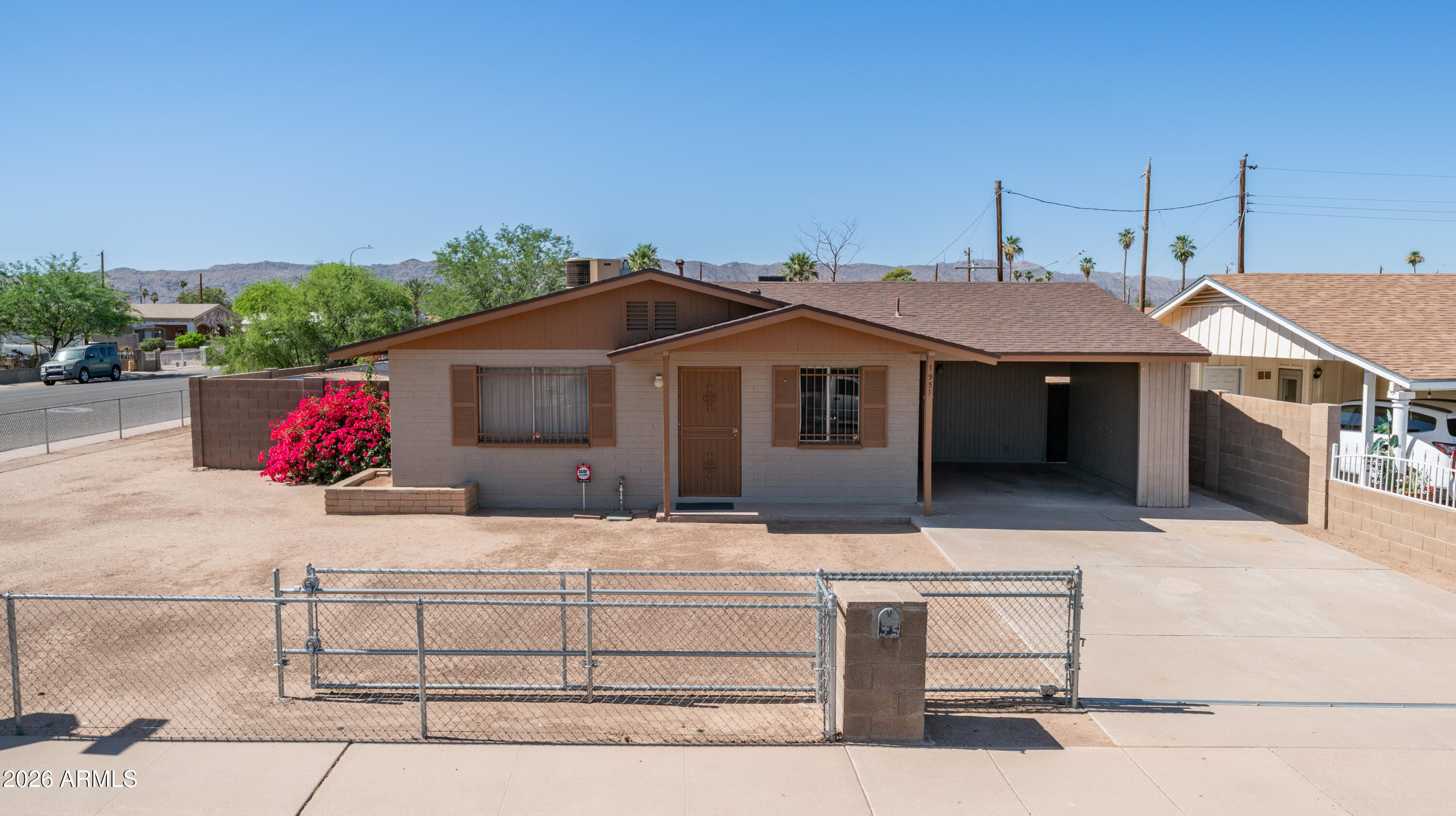 1951 E MARGUERITE Avenue, Phoenix, AZ 85040 — Photo 1 of 21