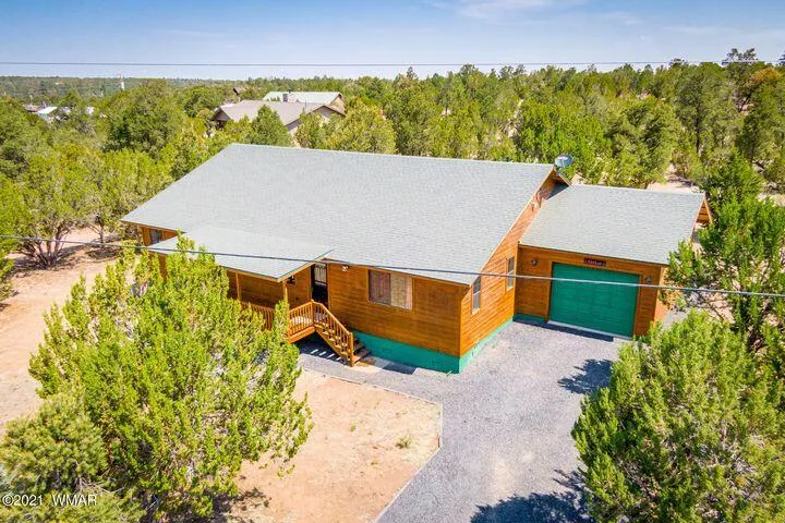 3244 Outlaw Trail, Overgaard, AZ 85933 — Photo 1 of 28