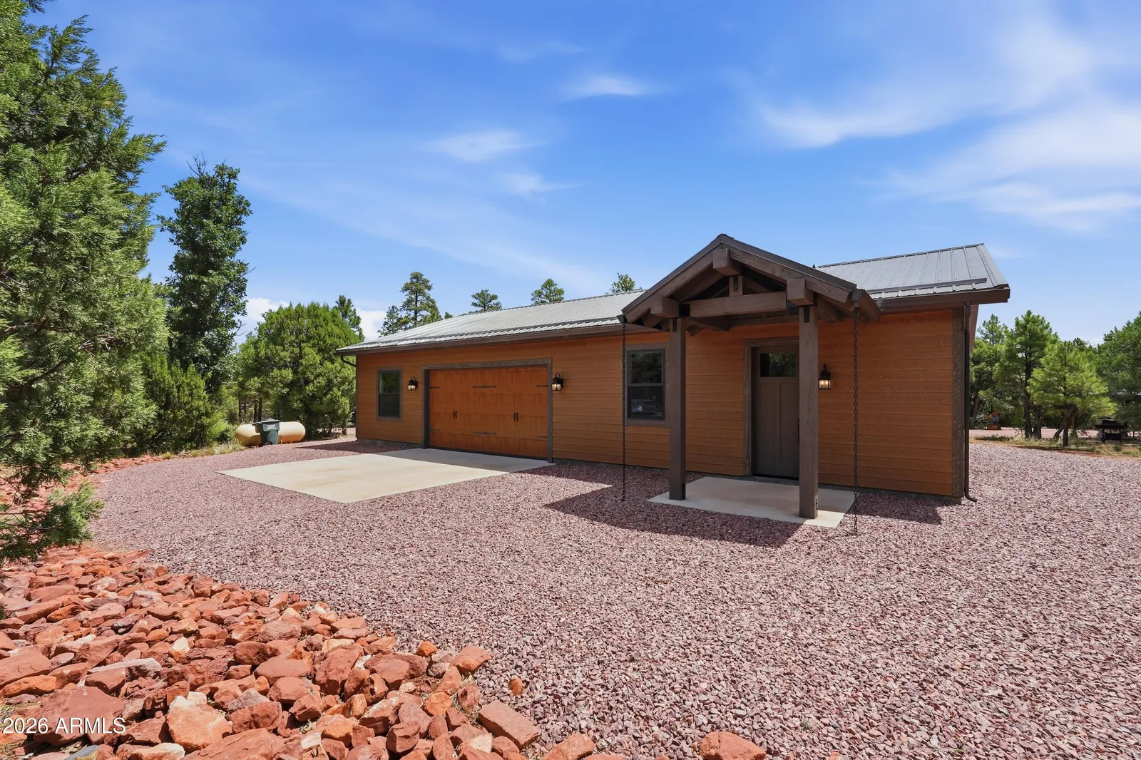 6163 MALLARD POND Drive, Happy Jack, AZ 86024 — Photo 1 of 56