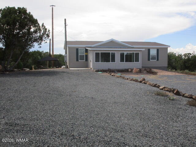 1852 Rainbow Circle, White Mountain Lake, AZ 85912 — Photo 1 of 25