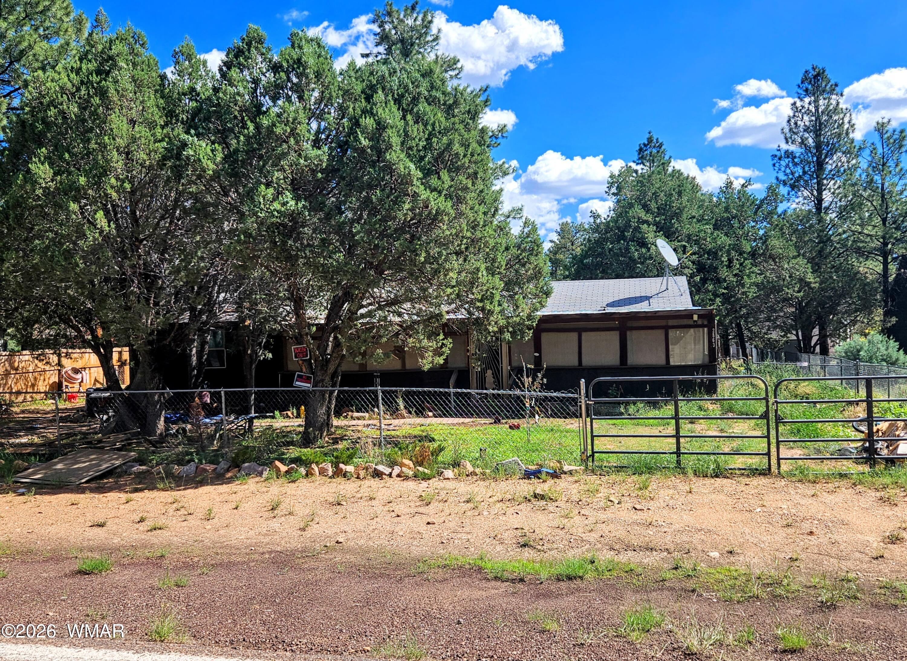 2863 Pine Rim Road, Overgaard, AZ 85928 — Photo 1 of 4
