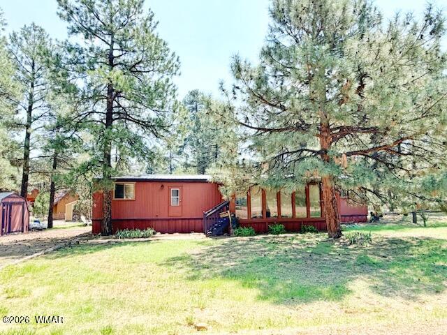 2839 Whispering Winds Drive, Overgaard, AZ 85933 — Photo 1 of 17